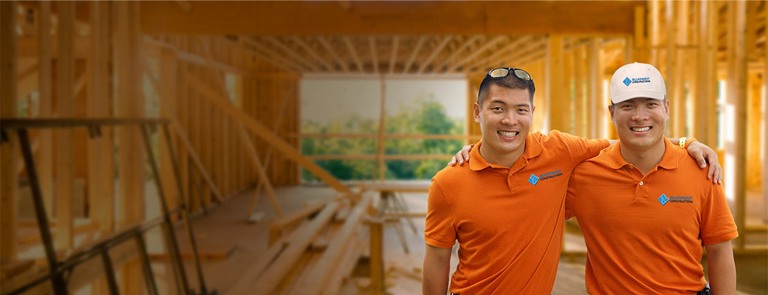 Construction workers wearing uniform custom embroidered polo shirts