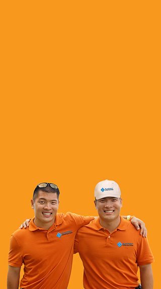 Construction workers wearing uniform custom embroidered polo shirts