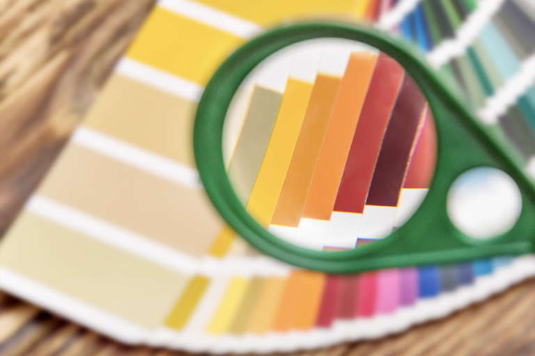 magnifying glass zooming in one different color charts
